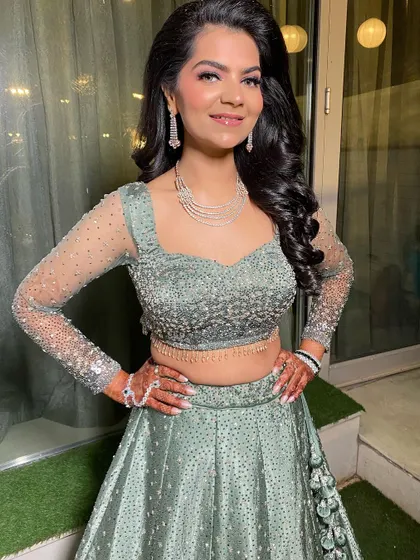 A close-up of Samiksha's flawless sangeet makeup. The look is all about sharp lines and a radiant glow.