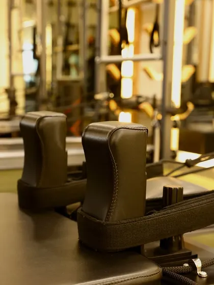A close-up of the reformer shoulder rests. Every piece of our Balanced Body equipment is designed for comfort and effectiveness.