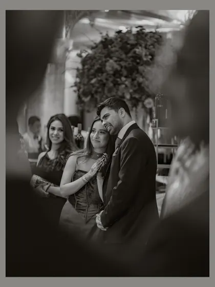 A stolen glance through the crowd. I am always looking for unique perspectives to tell your story, capturing those private moments that happen amidst the celebration.