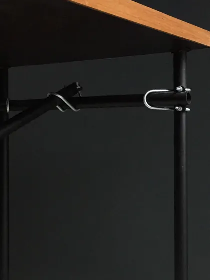 A detail from our "scaffolding table," which uses a clamp-based system with zero welding. This modular design is inspired by industrial scaffolding, allowing it to be easily assembled, scaled, and repurposed.