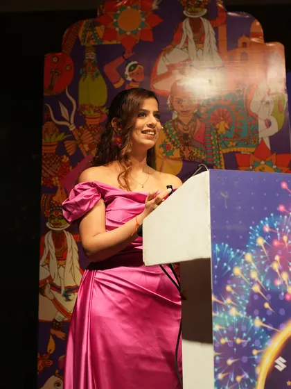 Another look from the podium at the Maruti Suzuki event. The colorful backdrop perfectly matched the festive mood of the evening.
