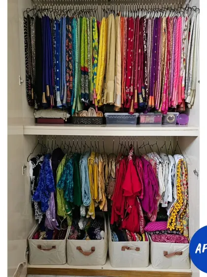 Before, this cupboard's potential was hidden by clutter. After our session, we tapped into the full space, using hanging rods for sarees and bins for blouses to create a beautiful and practical ethnic wear closet.
