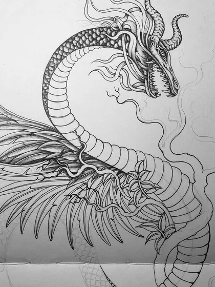 A progress shot of the dragon-snake tattoo design.
