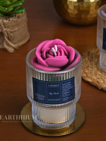 Meet 'After Dark', my floral votive candle in a striking magenta. It's set in a modern, ribbed glass jar that looks beautiful when the candle is lit.