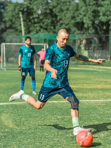 A powerful shot from a player, demonstrating great technique and power.