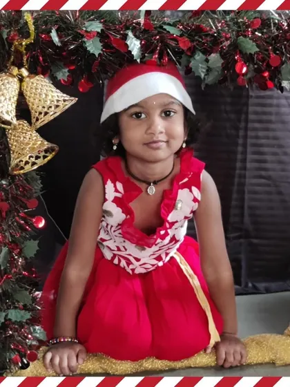 Another adorable Christmas portrait. We make sure every child feels special during our celebrations.