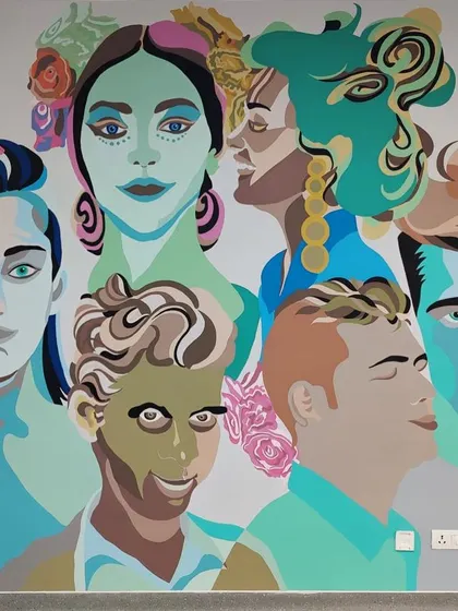 A colorful portrait mural for Arete Hospitals in Hyderabad, based on the brief "I choose to be happy." The artwork is a composite of imagined strangers, celebrating the beauty and kindness found in chance encounters.