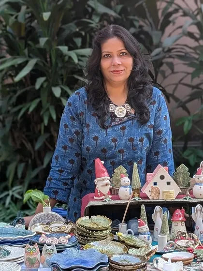 My stall at the Delhi Potter's Market, filled with Christmas decor, tableware, and whimsical figurines. It was my first time in Delhi, and the appreciation for art was wonderful.