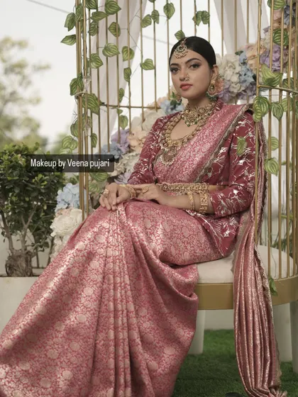 A full portrait of the model in a beautiful, ornate chair. This image captures the complete vision of our stylized shoot.