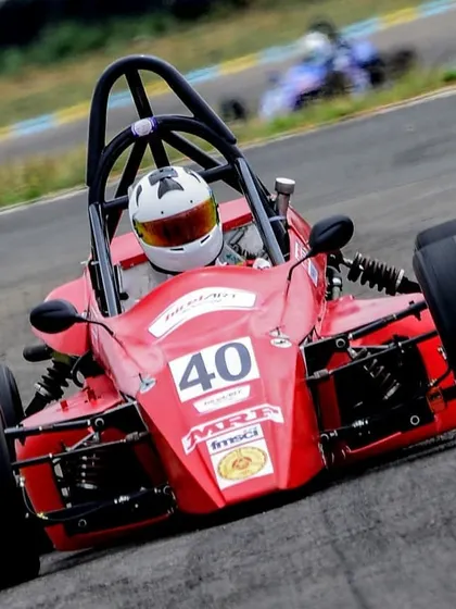 Another dynamic shot of car 40, emphasizing the thrilling experience of our formula racing program.