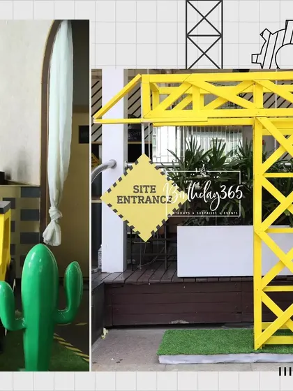 The entrance to Aryaveer's construction party, featuring a large yellow crane archway that immediately sets the theme.