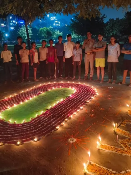 My students and I celebrating Diwali at the academy. We created a rangoli of a running track to celebrate our shared passion for athletics.
