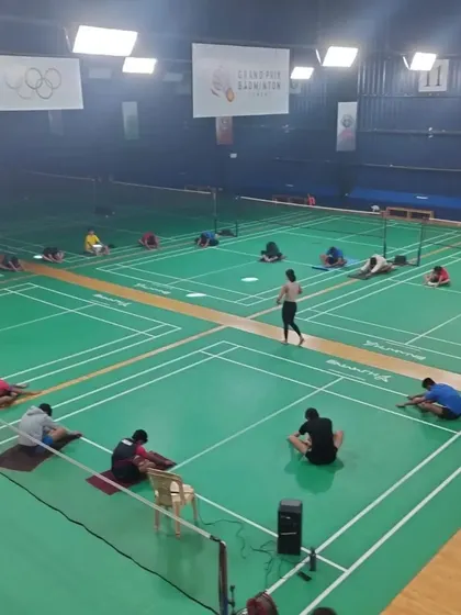 Athletes are led through a series of floor stretches designed to improve flexibility and aid in muscle recovery. Integrating yoga and mindful movement helps reduce the risk of injury and improves overall athletic longevity.