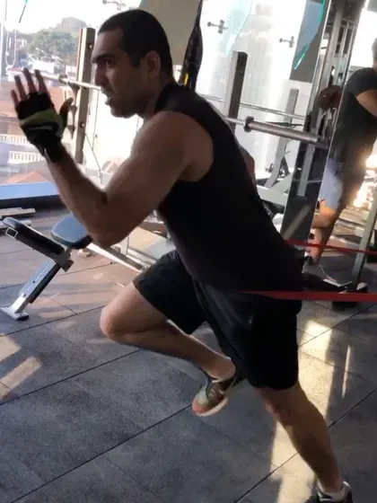 Another shot of the resistance band running drill, showing the intensity and focus required during our training sessions.