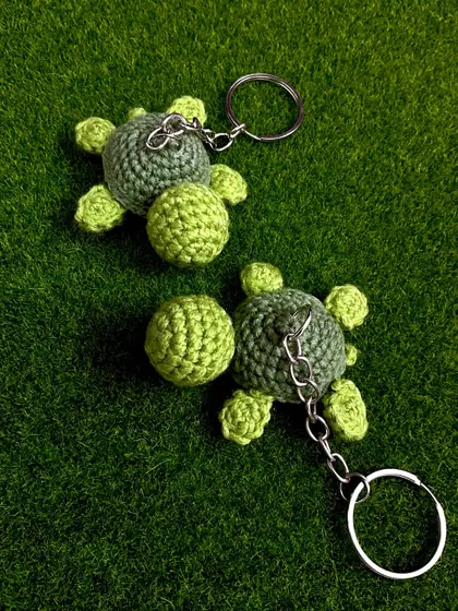 These tiny turtle keychains are one of my favorite little creations. They are handmade with intricate stitches and make for an adorable accessory for your keys or as a bag charm.