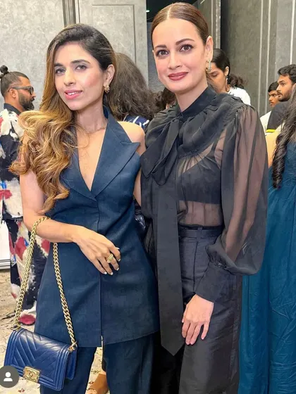 Here I am with a client at the Elle India lifestyle awards. For her, I created a simple yet elegant look with soft waves and a side part to complement her chic navy blue outfit.