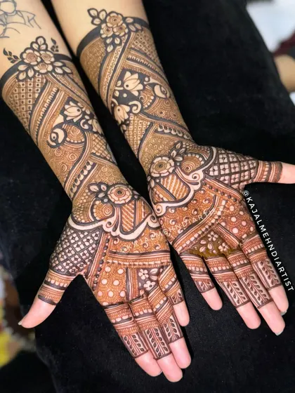 A beautiful design for a Roka ceremony. This full-hand henna combines peacocks, florals, and geometric patterns, making it a perfect choice for the bride to be.