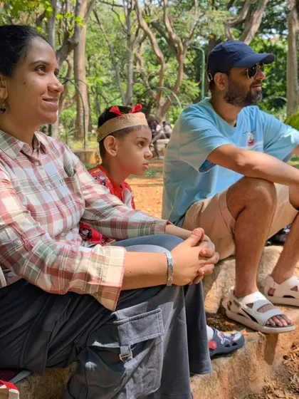 A family completely absorbed in a nature tale. I love seeing parents and children share these quiet, focused moments together, away from the distractions of daily life.