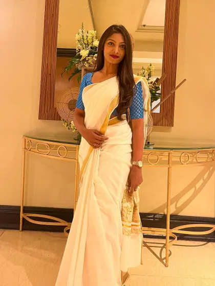 Dressed in a traditional Kerala Kasavu saree for the Kerala Tourism Partnership Meet. Embracing local culture is key to connecting with the audience.