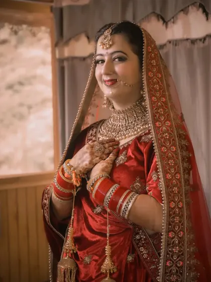 An indoor bridal portrait showing a moment of quiet contemplation. Even without a mountain view, we can create beautiful, intimate photos.
