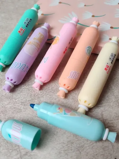 These candy-shaped highlighters add a sweet touch to any stationery collection. The set of six comes in various pastel colors.