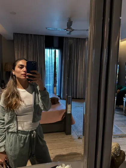 There's no outfit more comfortable than a tracksuit. A mirror selfie in a cozy velour set.