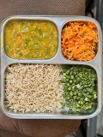 A repeat of the simple, fiber-rich meal of brown rice, bottle gourd dal, and a side of sautéed carrots and beans.