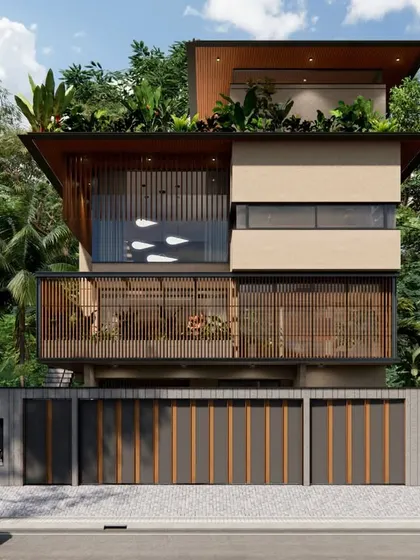 A frontal view of the 18th Avenue House, clearly showing the Vastu-compliant planning and the layered volumes that avoid a monolithic, tower-like mass.