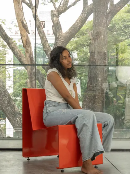 Our minimalist chair, pictured in our studio, offers a comfortable spot for relaxation and inspiration. Its design was born from the question of how to blend ergonomic comfort with versatility and ease of manufacturing.