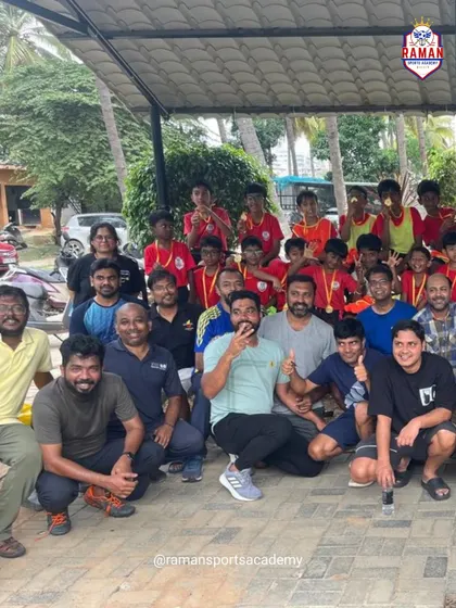 A group photo of our young players, parents, and coaches after a successful and fun-filled Community Fest.