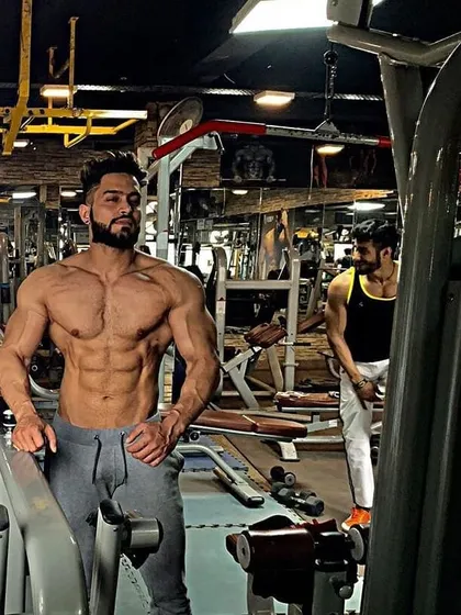 Bodybuilding is an art. This shot in the gym environment shows the physique as a work in progress, always being sculpted and refined.