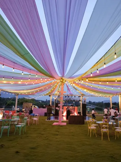 A Sangeet night is for pure, uninhibited joy. We transformed this open lawn into a festival of celebration with a canopy of pastel drapes and glowing bulbs, setting the stage for an evening of music, dance, and unforgettable performances.