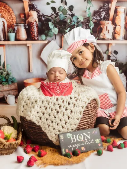 Another adorable shot from the chef-themed sibling session, with both kids in their chef hats.
