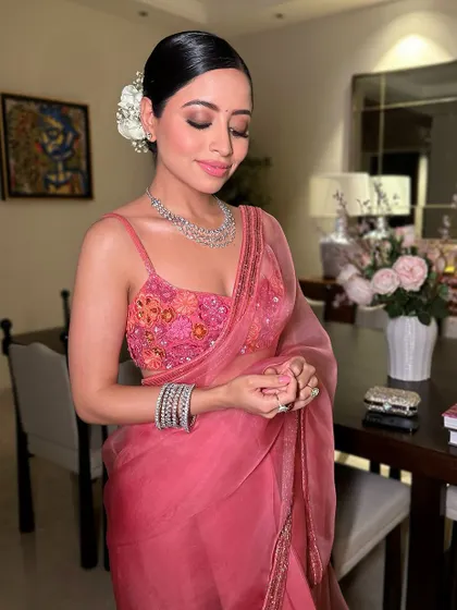 A close-up of Sunaina Khera's Diwali glam, showing the soft, shimmery eye and the flawless, glowing skin.