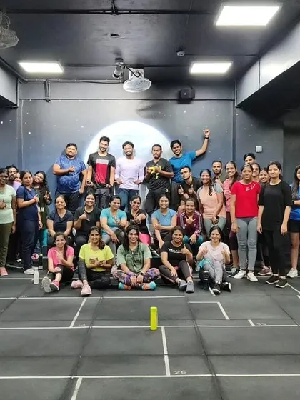 The heart and soul of my classes. Each photo captures a unique moment with my incredible community after a sweaty, joyful session. This is our shared victory lap.