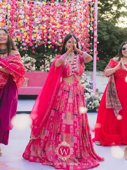 Celebrating one of our own with a vibrant Mehendi on a home terrace. The decor was filled with colorful hanging flowers and lush floral arrangements, creating a joyful setting for lots of dancing and fun.
