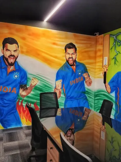 One section of the Crictracker mural, featuring portraits of Virat Kohli and Rohit Sharma against the backdrop of the Indian flag.