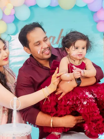 The cake smash is a highlight of any first birthday. We capture the pure joy and mess as the family encourages their little one to take her first bite of birthday cake.