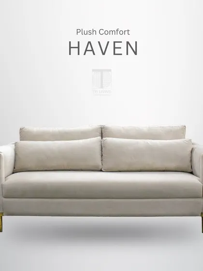 A plush comfort haven. This modern sofa features clean lines, deep cushions, and elegant metal legs, creating a chic and comfortable centerpiece.