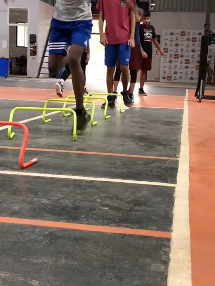 Agility and footwork are crucial. Our players work through hurdle drills to improve their speed, coordination, and explosiveness on the court.
