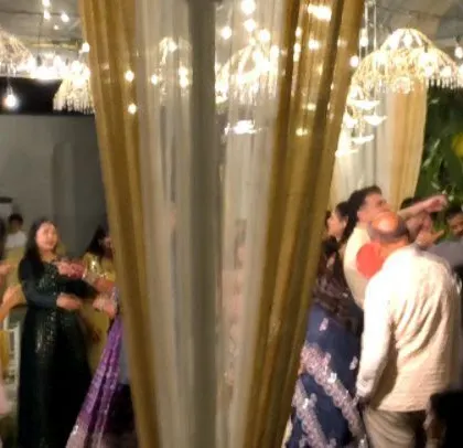 The dance floor is full at this cross-cultural wedding celebration.