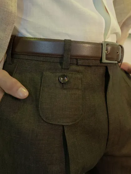 We focus on the details, like this stylish piped patch pocket, to elevate our linen ensembles.