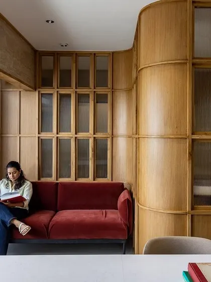 A student taking a moment to read in our beautifully designed lounge.