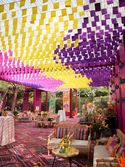A view of the colorful woven ceiling, a key feature of the Mexican fiesta theme that creates a vibrant and festive atmosphere.