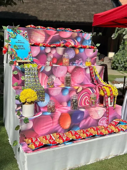 A "90's Nostalgia" candy bar, a fun and interactive station for guests at a Mehendi or Sangeet.