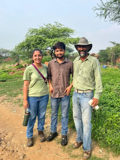 Our rewilding expert, Vijay Dhasmana, with two of our dedicated team members at the Aravali Nagar Van restoration site.