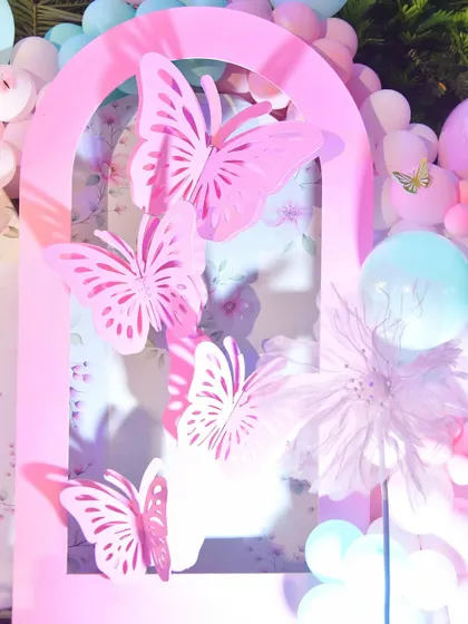 A close-up of our custom-made pink butterfly panel, featuring intricate 3D butterfly cutouts.