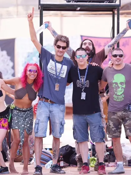 A happy group portrait of festival-goers. This photo captures the sense of community and shared experience that makes these events special.