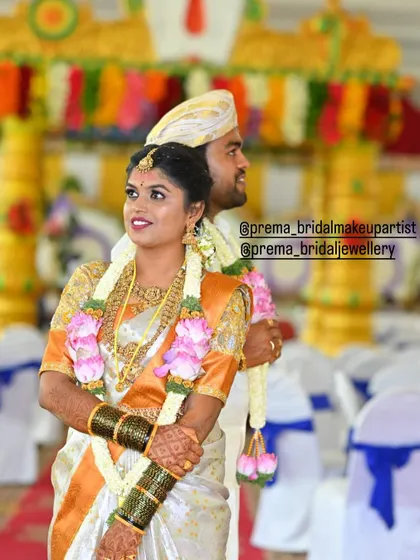 A candid shot of the couple, with the bride's jewellery shining.