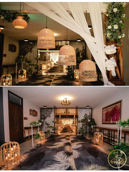 A detailed look at the boho-chic entrance corridor, with rattan lamps and a palm-leaf-patterned runner.